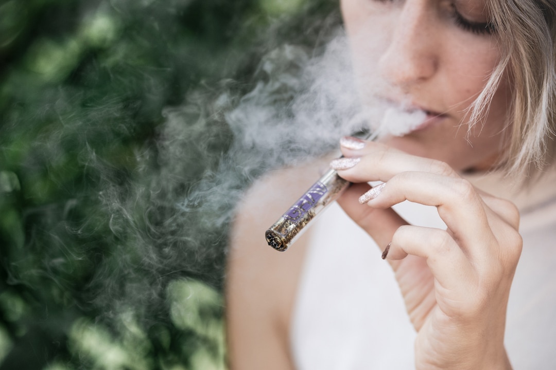 Girl-smoking-cannabis-image-Grav-@-Unsplash